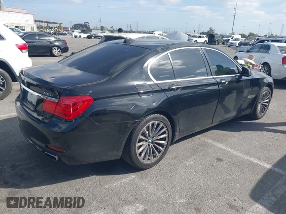 2012 BMW 7 Series 740i with VIN WBAKA4C5XCDS99253, listed as a IAAI auction lot 41710171 with 176,907 mi miles. Bid and sale history available at carsss.com. Image 4.