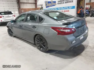 2018 Nissan Altima 2.5 SV with VIN 1N4AL3AP5JC470135, listed as a IAAI auction lot 41801045 with 122,452 mi miles. Bid and sale history available at carsss.com. Image 3.