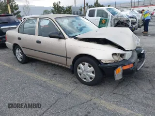 1994 Toyota Corolla with VIN JT2AE04B7R0074250, listed as a IAAI auction lot 41752125 with 245,033 mi miles and . Bid and sale history available at DreamBid. Image 1.