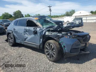 2025 Mazda CX-50 S Premium Plus with VIN 7MMVABEM1SN319228, listed as a Copart auction lot 55958135 with 4,133 mi miles and Salvage title. Bid and sale history available at DreamBid. Image 4.