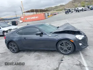 2016 Scion FR-S with VIN JF1ZNAA11G9708176, listed as a IAAI auction lot 41787608 with 82,815 mi miles. Bid and sale history available at carsss.com. Image 13.