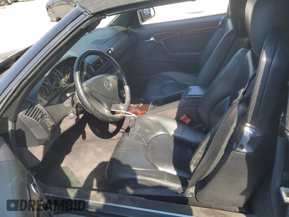 2001 Mercedes-Benz SL 500 with VIN WDBFA68FX1F196609, listed as a Copart auction lot 76124154 with 49,809 mi miles and Salvage title. Bid and sale history available at DreamBid. Image 7.