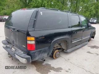 2006 Chevrolet Suburban Z71 z VIN 3GNFK16Z56G129802, wystawiony jako IAAI lot #42121860 z przebiegiem 299 841 mil mil oraz . Historia ofert i sprzedaży dostępna na DreamBid. Obrazek 4.