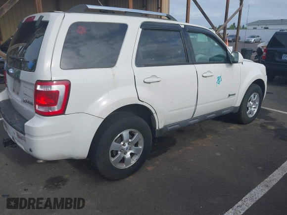 2009 Ford Escape Hybrid with VIN 1FMCU593X9KB70360, listed as a IAAI auction lot 42270239 with 133,658 mi miles and . Bid and sale history available at DreamBid. Image 4.