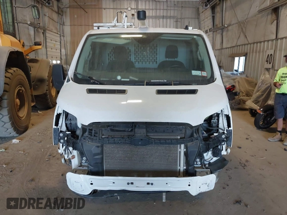2023 Ford Transit Cargo with VIN 1FTBR1Y86PKA79798, listed as a IAAI auction lot 40155361 with 28,670 mi miles and . Bid and sale history available at DreamBid. Image 11.