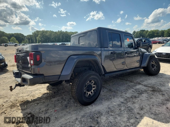 2021 Jeep Gladiator 80th Anniversary с VIN 1C6HJTAG7ML521094, выставлен на аукционе Copart как лот 61276595 с пробегом 68 684 миль миль и Списание • Salvage title. История ставок и продаж доступна на DreamBid. Изображение 3.