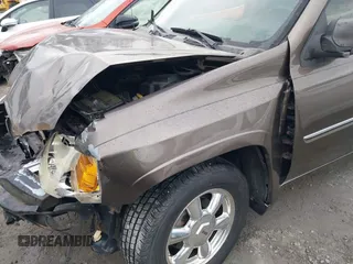 2008 GMC Envoy SLE2 with VIN 1GKDS13S882139862, listed as a IAAI auction lot 41458976 with 195,973 mi miles. Bid and sale history available at carsss.com. Image 6.