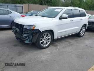 2014 Jeep Grand Cherokee Summit z VIN 1C4RJFJG2EC476114, wystawiony jako IAAI lot #42249108 z przebiegiem 97 569 mil mil oraz . Historia ofert i sprzedaży dostępna na DreamBid. Obrazek 18.