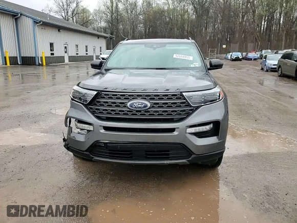 2021 Ford Explorer XLT with VIN 1FMSK8DHXMGA22114, listed as a Copart auction lot 52604955 with 212,538 mi miles and Salvage Title. Bid and sale history available at carsss.com. Image 14.