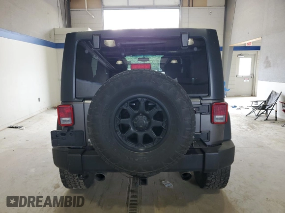 2016 Jeep Wrangler Unlimited Sport z VIN 1C4BJWDG8GL188601, wystawiony jako Copart lot #59760605 z przebiegiem 102 062 mil mil oraz Szkoda całkowita • Salvage title. Historia ofert i sprzedaży dostępna na DreamBid. Obrazek 6.