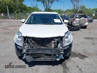 2016 Cadillac SRX Luxury Collection z VIN 3GYFNEE34GS513728, wystawiony jako IAAI lot #41847871 z przebiegiem 109 045 mil mil oraz . Historia ofert i sprzedaży dostępna na DreamBid. Obrazek 12.