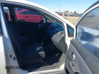 2009 Nissan Versa 1.8 SL with VIN 3N1BC13E89L410688, listed as a IAAI auction lot 41447457 with 182,807 mi miles. Bid and sale history available at carsss.com. Image 5.