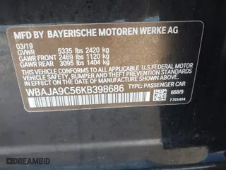 2019 BMW 5 Series 530e iPerformance with VIN WBAJA9C56KB398686, listed as a IAAI auction lot 41507090 with 64,395 mi miles. Bid and sale history available at carsss.com. Image 9.