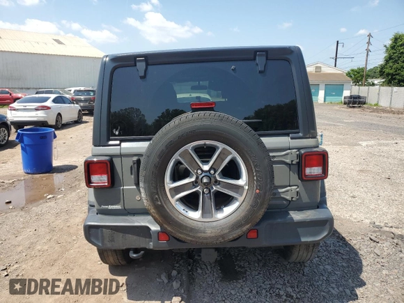 2018 Jeep Wrangler Unlimited Sahara with VIN 1C4HJXEN2JW220882, listed as a Copart auction lot 57428525 with 94,046 mi miles and Salvage title. Bid and sale history available at DreamBid. Image 6.