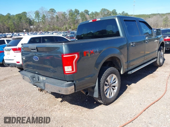 2015 Ford F-150 XLT with VIN 1FTEW1EG2FFC68540, listed as a IAAI auction lot 41586078 with 207,095 mi miles. Bid and sale history available at carsss.com. Image 4.