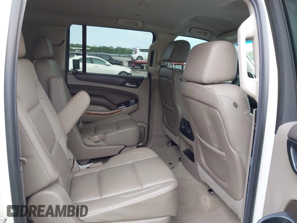 2015 Chevrolet Suburban LTZ with VIN 1GNSKKKC4FR687923, listed as a IAAI auction lot 42192062 with 139,873 mi miles and . Bid and sale history available at DreamBid. Image 8.