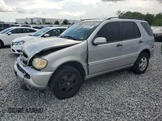 2002 Mercedes-Benz M 320/430/500 z VIN 4JGAB54E82A312304, wystawiony jako Copart lot #60443205 z przebiegiem 158 932 mil mil oraz Szkoda całkowita • Salvage title. Historia ofert i sprzedaży dostępna na DreamBid. Obrazek 1.