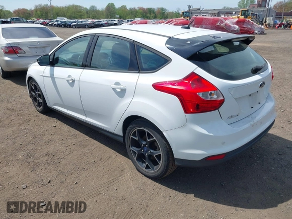 2013 Ford Focus SE with VIN 1FADP3K29DL182434, listed as a IAAI auction lot 42138008 with 103,072 mi miles. Bid and sale history available at carsss.com. Image 3.