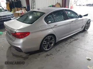 2020 BMW 5 Series M550i xDrive z VIN WBAJS7C07LCD85532, wystawiony jako IAAI lot #41518071 z przebiegiem 57 645 mil mil oraz . Historia ofert i sprzedaży dostępna na DreamBid. Obrazek 4.