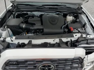 2023 Toyota Tacoma SR z VIN 3TMCZ5AN2PM583382, wystawiony jako Copart lot #58209775 z przebiegiem 17 442 mil mil oraz Szkoda całkowita • Salvage title. Historia ofert i sprzedaży dostępna na DreamBid. Obrazek 11.