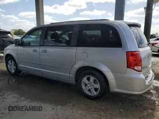 2012 Dodge Grand Caravan SXT with VIN 2C4RDGCG3CR373377, listed as a Copart auction lot 54604805 with 168,067 mi miles and Salvage Title. Bid and sale history available at DreamBid. Image 2.
