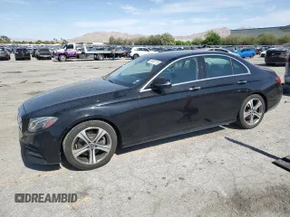 2018 Mercedes-Benz E 300 with VIN WDDZF4JB9JA301770, listed as a Copart auction lot 58951715 with 143,541 mi miles and Salvage title. Bid and sale history available at DreamBid. Image 1.