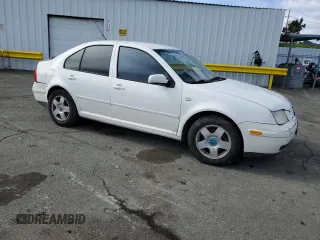 2002 Volkswagen Jetta GL с VIN 3VWRK69M52M024396, выставлен на аукционе Copart как лот 45539355 с пробегом 142 880 миль миль и Списание • Salvage title. История ставок и продаж доступна на DreamBid. Изображение 4.
