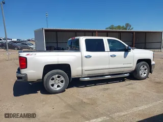 2014 Chevrolet Silverado 1500 LTZ with VIN 3GCUKSEC6EG431603, listed as a IAAI auction lot 41876132 with 99,062 mi miles. Bid and sale history available at carsss.com. Image 14.