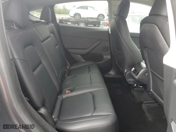 2023 Tesla Model Y Long Range with VIN 7SAYGDEE5PF918853, listed as a Copart auction lot 53551985 with 11,219 mi miles and Salvage Title. Bid and sale history available at carsss.com. Image 11.