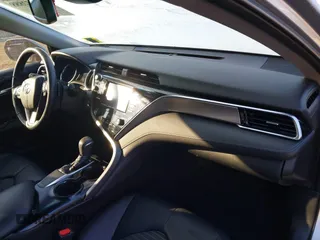 2018 Toyota Camry LE z VIN 4T1B11HK4JU616470, wystawiony jako IAAI lot #41352888 z przebiegiem 102 109 mil mil oraz . Historia ofert i sprzedaży dostępna na DreamBid. Obrazek 5.