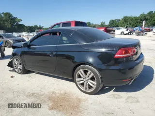 2012 Volkswagen Eos Lux with VIN WVWFW7AH7CV016872, listed as a Copart auction lot 52591415 with 121,130 mi miles and Salvage Title. Bid and sale history available at DreamBid. Image 2.