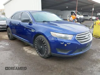 2014 Ford Taurus SE with VIN 1FAHP2D89EG153166, listed as a IAAI auction lot 41937695 with 154,247 mi miles. Bid and sale history available at carsss.com. Image 1.