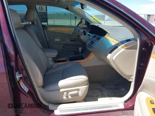 2006 Toyota Avalon XL with VIN 4T1BK36B36U087385, listed as a IAAI auction lot 41986866 with 128,594 mi miles. Bid and sale history available at carsss.com. Image 5.