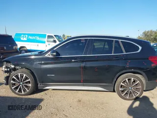2018 BMW X1 sDrive28i with VIN WBXHU7C30J5L04913, listed as a IAAI auction lot 41755344 with 101,867 mi miles. Bid and sale history available at carsss.com. Image 15.
