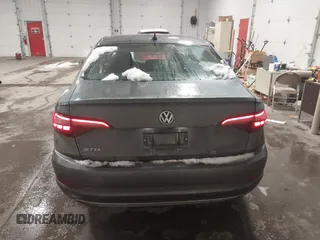 2021 Volkswagen Jetta S z VIN 3VWC57BU6MM001399, wystawiony jako IAAI lot #41488758 z przebiegiem 44 442 mil mil oraz . Historia ofert i sprzedaży dostępna na DreamBid. Obrazek 16.