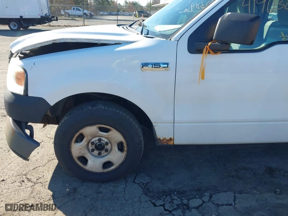 2005 Ford F-150 XL with VIN 1FTRF12285NB41452, listed as a IAAI auction lot 41903892 with 290,233 mi miles. Bid and sale history available at carsss.com. Image 12.