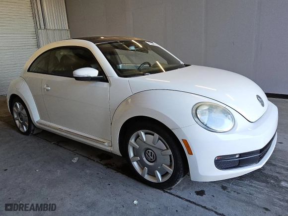 2012 Volkswagen Beetle 2.5L w/Sun/Sound/Nav PZEV with VIN 3VWHP7AT5CM638470, listed as a Copart auction lot 83471284 with 87,912 mi miles and Clean Title. Bid and sale history available at carsss.com. Image 4.