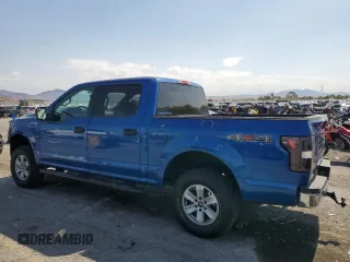 2018 Ford F-150 XL with VIN 1FTEW1EGXJKD26409, listed as a Copart auction lot 59403645 with 122,373 mi miles and Salvage title. Bid and sale history available at DreamBid. Image 2.