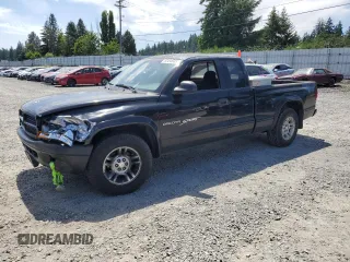 2001 Dodge Dakota z VIN 1B7GL22X81S338912, wystawiony jako Copart lot #60494935 z przebiegiem 194 401 mil mil oraz Szkoda całkowita • Salvage title. Historia ofert i sprzedaży dostępna na DreamBid. Obrazek 1.