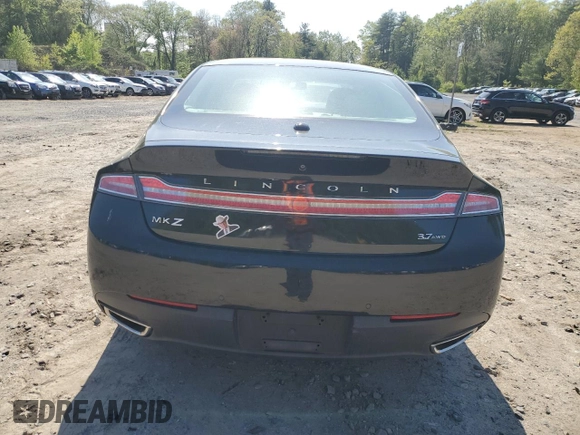 2014 Lincoln MKZ z VIN 3LN6L2JK4ER805421, wystawiony jako Copart lot #56781605 z przebiegiem 90 061 mil mil oraz Tytuł czysty. Historia ofert i sprzedaży dostępna na DreamBid. Obrazek 6.