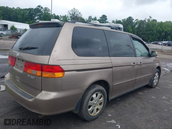 2003 Honda Odyssey EX-L with VIN 5FNRL180X3B151488, listed as a IAAI auction lot 42681426 with 231,065 mi miles and . Bid and sale history available at DreamBid. Image 4.