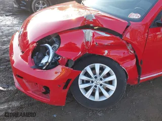 2019 Volkswagen Beetle S with VIN 3VWFD7AT1KM712384, listed as a IAAI auction lot 41505127 with 49,527 mi miles. Bid and sale history available at carsss.com. Image 6.