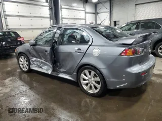 2015 Mitsubishi Lancer GT with VIN JA32U8FW4FU022218, listed as a Copart auction lot 84468334 with 76,297 mi miles and Salvage Title. Bid and sale history available at carsss.com. Image 2.