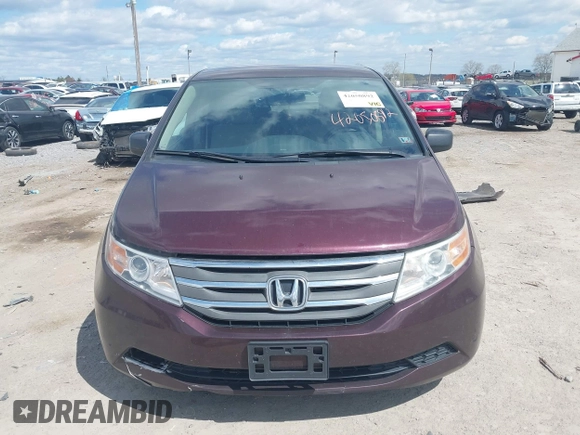 2013 Honda Odyssey LX with VIN 5FNRL5H28DB058401, listed as a IAAI auction lot 42050892 with 221,016 mi miles and . Bid and sale history available at carsss.com. Image 12.