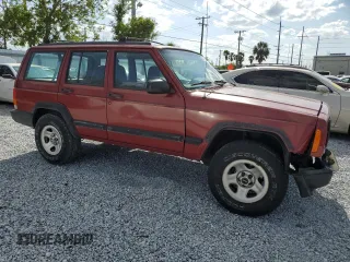 1998 Jeep Cherokee Sport with VIN 1J4FT68S4WL270134, listed as a Copart auction lot 51019695 with 246,945 mi miles and Non Repairable. Bid and sale history available at carsss.com. Image 4.