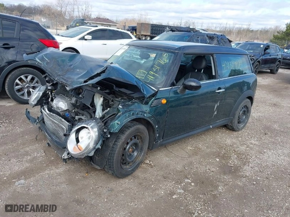 2010 MINI Cooper Clubman with VIN WMWML3C57ATX51076, listed as a IAAI auction lot 41931760 with 80,970 mi miles. Bid and sale history available at carsss.com. Image 2.