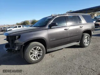 2017 Chevrolet Tahoe LS with VIN 1GNSCAKCXHR355107, listed as a Copart auction lot 87479794 with 121,880 mi miles and Salvage Title. Bid and sale history available at carsss.com. Image 1.