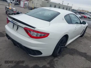 2012 Maserati GranTurismo MC Stradale with VIN ZAM45MLA9C0065671, listed as a IAAI auction lot 40990883 with 27,041 mi miles. Bid and sale history available at carsss.com. Image 4.