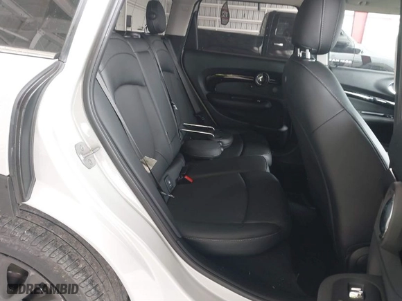 2019 MINI Cooper Clubman with VIN WMWLN5C53K2E34830, listed as a IAAI auction lot 41419983 with 64,716 mi miles. Bid and sale history available at carsss.com. Image 8.