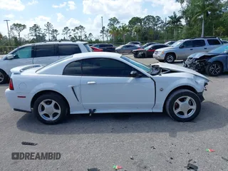 2004 Ford Mustang Standard with VIN 1FAFP40404F103699, listed as a IAAI auction lot 41804765 with 193,986 mi miles. Bid and sale history available at carsss.com. Image 13.